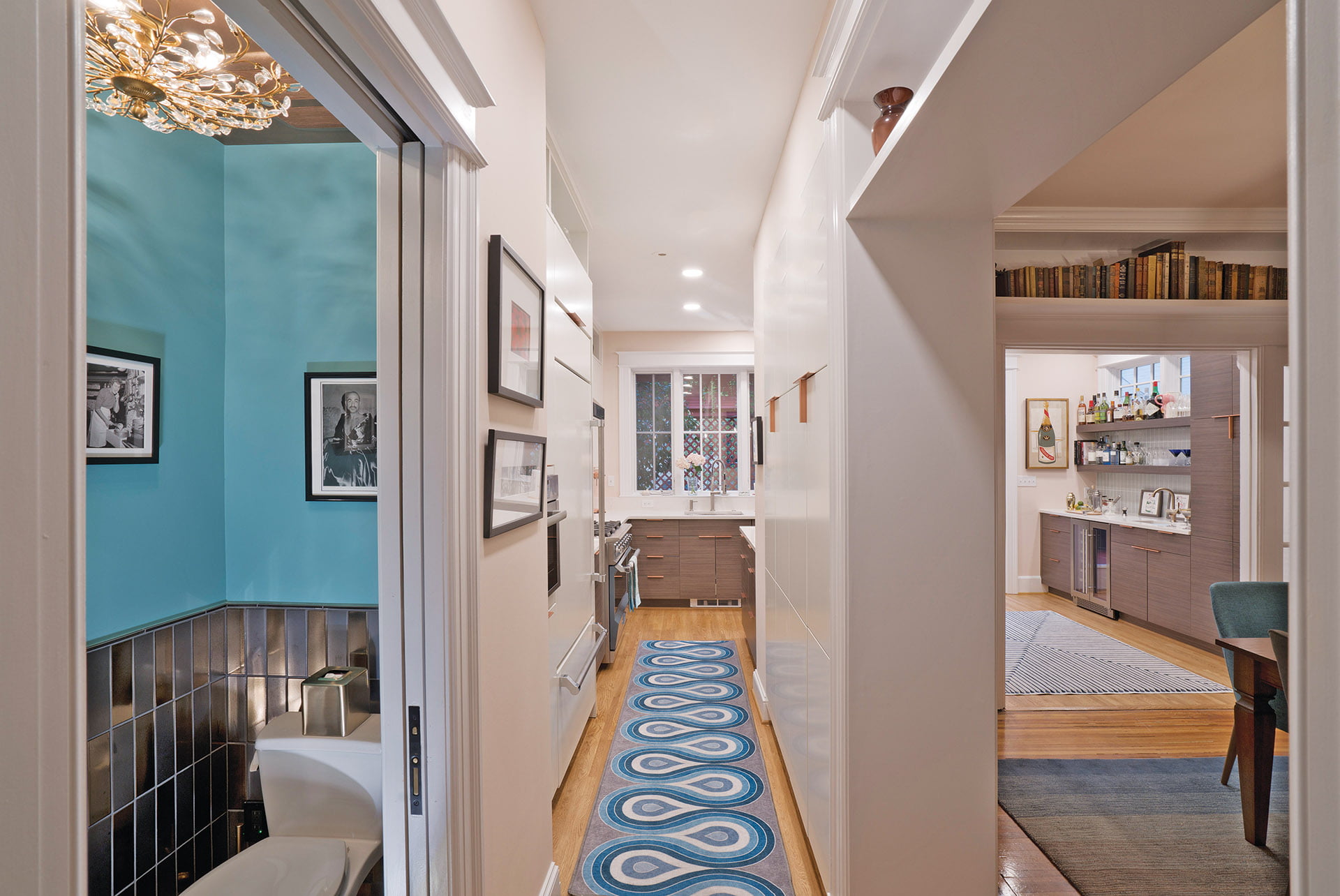 A wall of pantry cabinets is part of the semi-open floor plan.